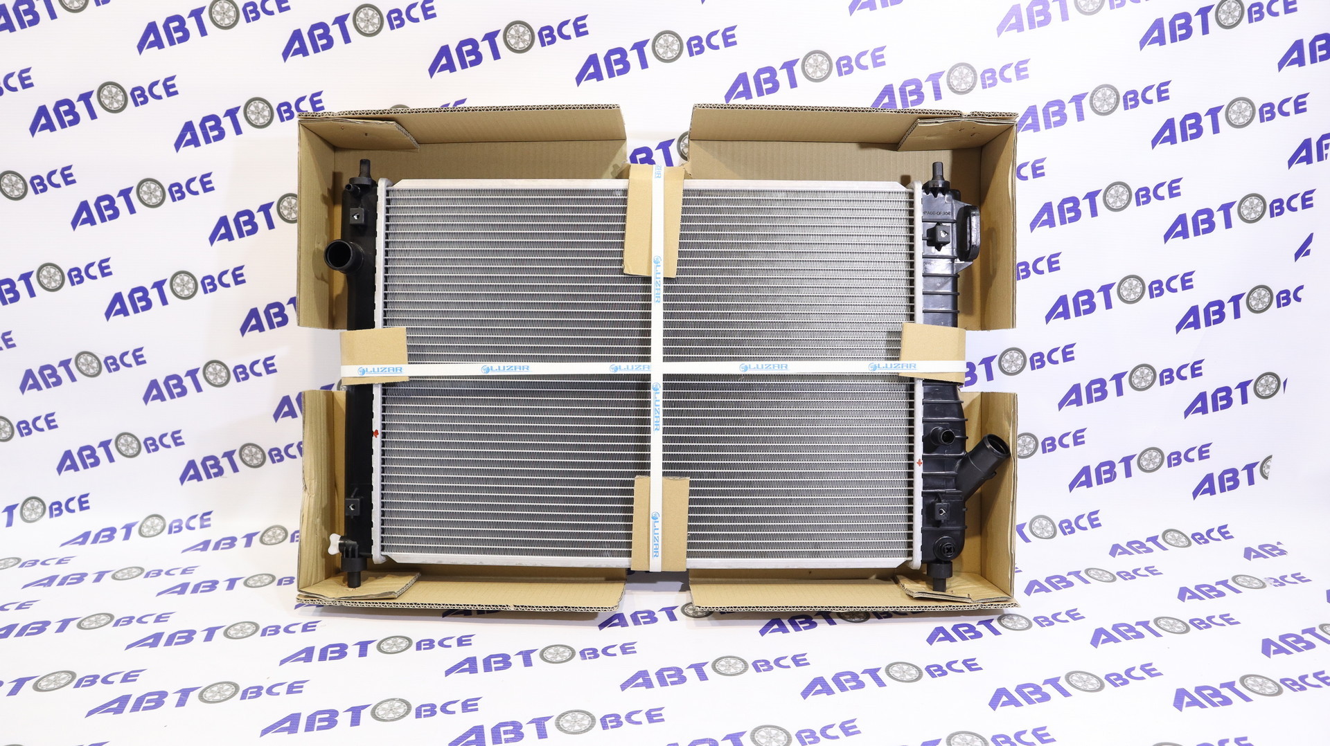 Радиатор основной (охлаждение) Aveo T255 HB АКПП с АС LUZAR